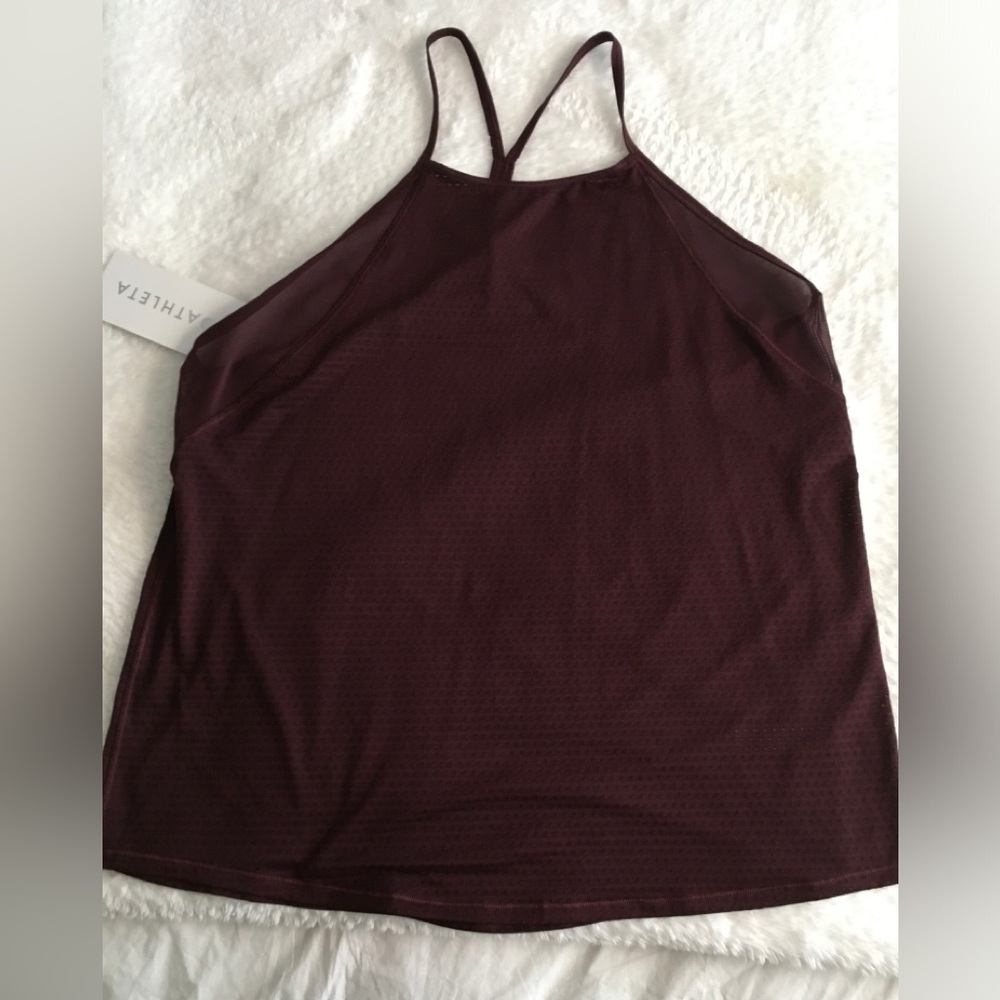 Athleta Chi Mesh Train Tank
Ultra lightweight 
Fits close to skin, hip length